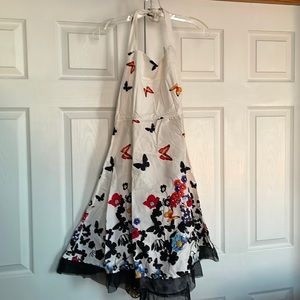 Halter dress with butterfly design.